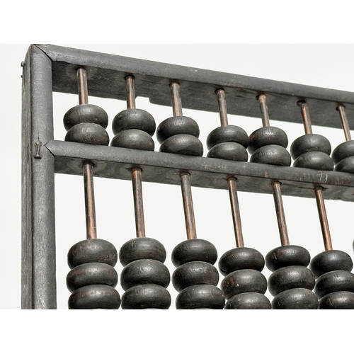 354 - A late 19th/early 20th century Chinese Abacus. 35x17cm