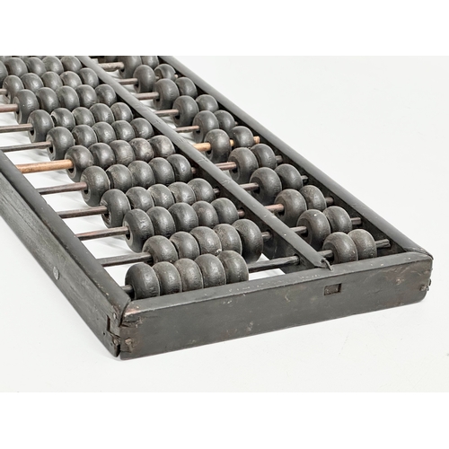 354 - A late 19th/early 20th century Chinese Abacus. 35x17cm