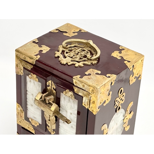 388 - A Chinese style brass bound tabletop jewellery cabinet.