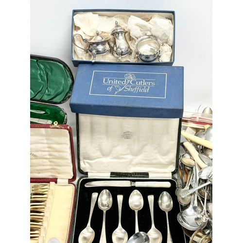 351 - A large quantity of vintage cutlery. Silver plate, EPNS, stainless.