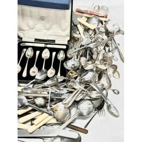 351 - A large quantity of vintage cutlery. Silver plate, EPNS, stainless.