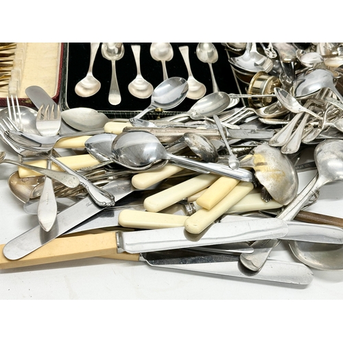 351 - A large quantity of vintage cutlery. Silver plate, EPNS, stainless.