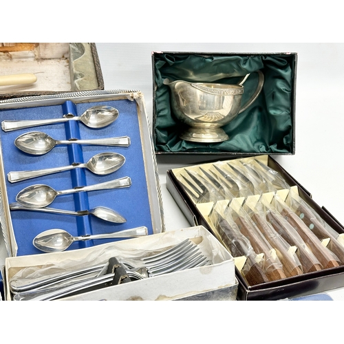 352 - A quantity of vintage cutlery. Silver plate, EPNS, Stainless.