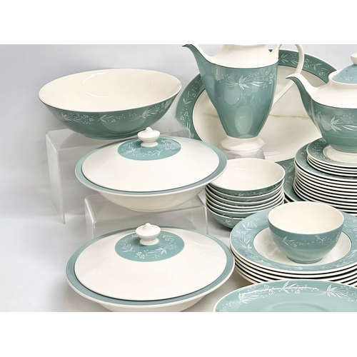 389 - A 68 piece Royal Doulton ‘Cascade’ tea, coffee and dinner service. D.6457. Doulton & Co Limited. 3 t... 