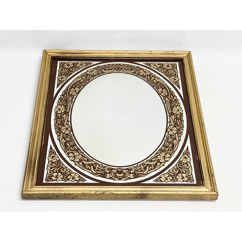 301 - An early/mid 20th century Art Nouveau gilt framed mirror. Circa 1930-1950. 45x56cm