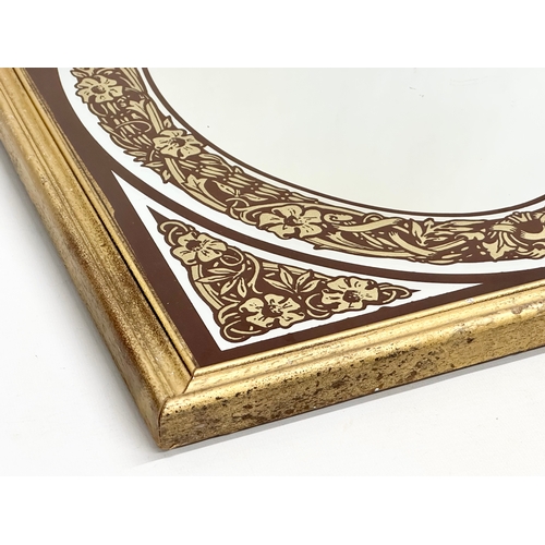 301 - An early/mid 20th century Art Nouveau gilt framed mirror. Circa 1930-1950. 45x56cm