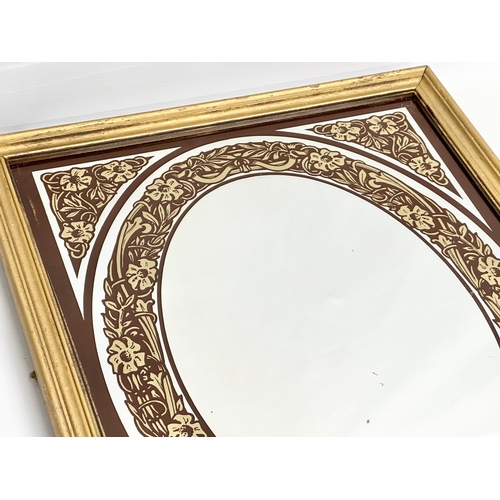 301 - An early/mid 20th century Art Nouveau gilt framed mirror. Circa 1930-1950. 45x56cm