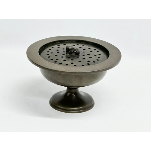 168 - An early 20th century Far Eastern bronze incense burner. 23x14cm