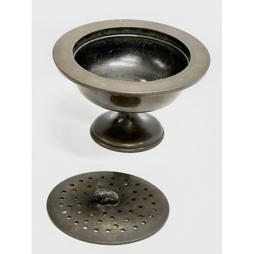 168 - An early 20th century Far Eastern bronze incense burner. 23x14cm