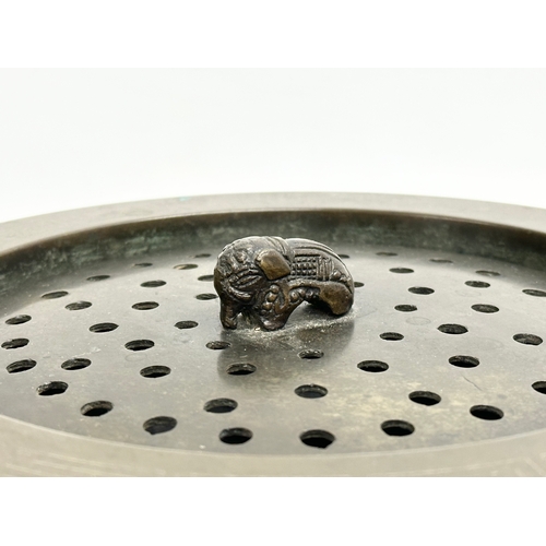 168 - An early 20th century Far Eastern bronze incense burner. 23x14cm