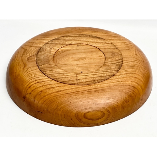 195 - A large Mid Century teak bowl. 1960-1970. 44x7cm