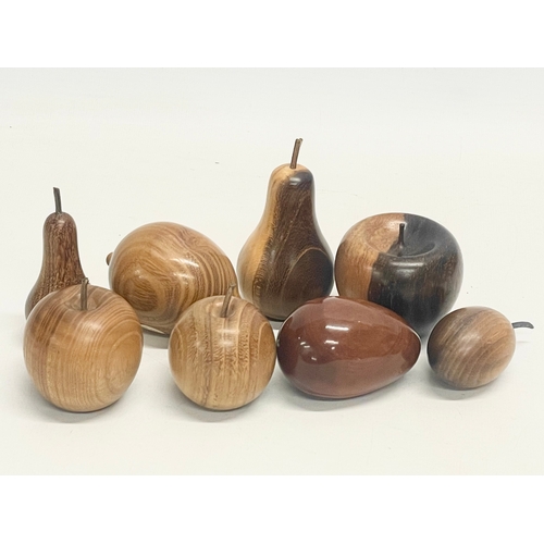 202 - A set of good quality carved wooden fruit in bowl. Including Laburnum, Walnut, Padauk, Chestnut, Oli... 