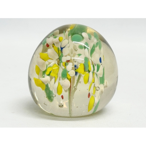 173 - A late 19th/early 20th century glass dump paperweight and 3 others. A vintage millefiori paperweight... 