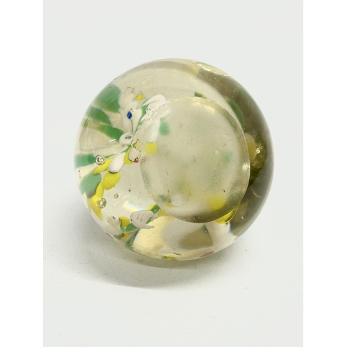 173 - A late 19th/early 20th century glass dump paperweight and 3 others. A vintage millefiori paperweight... 