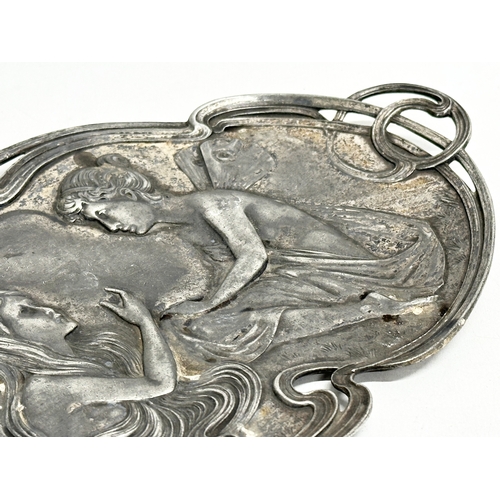 304 - An early 20th century Art Nouveau pewter tray. WMF. 27x17cm