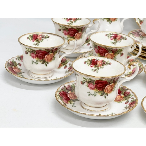 306 - A 26 piece Royal Albert ‘Old Country Roses’ tea service. Teapot 25x15x20cm. 6 cups and 6 saucers. Sa... 