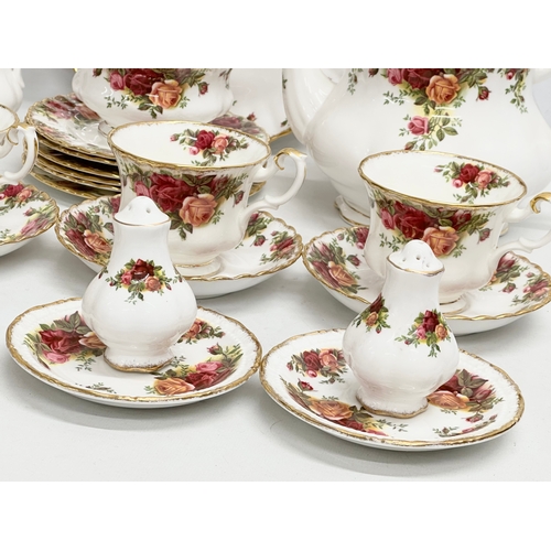 306 - A 26 piece Royal Albert ‘Old Country Roses’ tea service. Teapot 25x15x20cm. 6 cups and 6 saucers. Sa... 