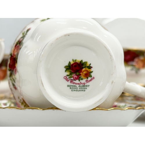 306 - A 26 piece Royal Albert ‘Old Country Roses’ tea service. Teapot 25x15x20cm. 6 cups and 6 saucers. Sa... 