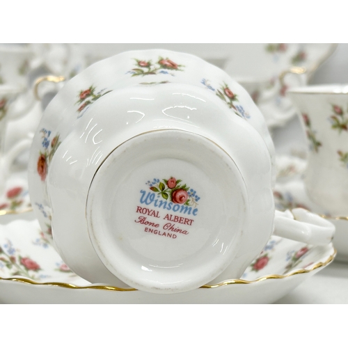 307 - A 22 piece Royal Albert ‘Winsome’ tea service. 2 tier cake stand. Cake plate. 6 cups and 6 saucers. ... 