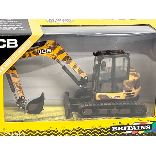 651 - A new Britains Muddy JCB Midi Excavator. 25x11x14cm