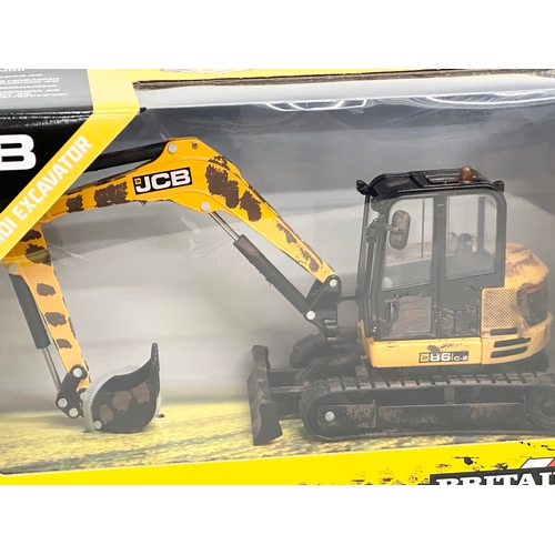 653 - A new Britains Muddy JCB Midi Excavator. 25x11x14cm