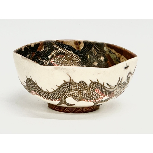 127 - A rare signed Japanese Meiji Period Satsuma bowl with hand painted embossed dragon and samurais. 12.... 