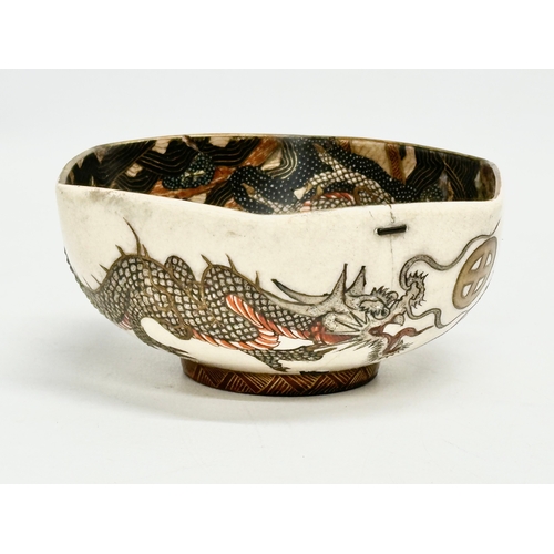 127 - A rare signed Japanese Meiji Period Satsuma bowl with hand painted embossed dragon and samurais. 12.... 