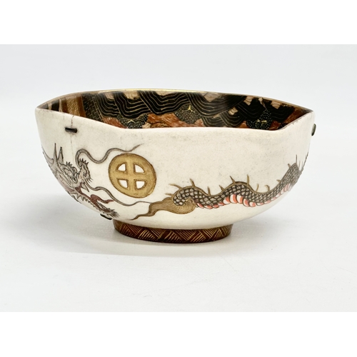 127 - A rare signed Japanese Meiji Period Satsuma bowl with hand painted embossed dragon and samurais. 12.... 