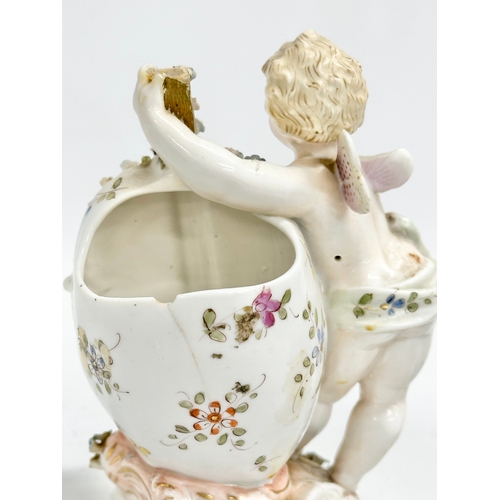 278 - Late 19th century porcelain cherubs. A pair of late 19th century cherub spill vases and a porcelain ... 