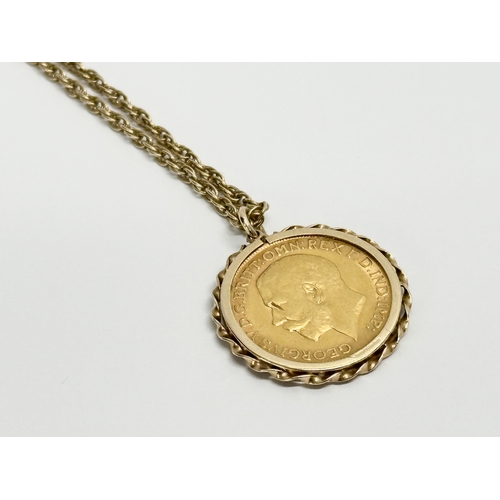 446 - A full gold sovereign with pendant and chain. 1911. 15.55 grams with chain.