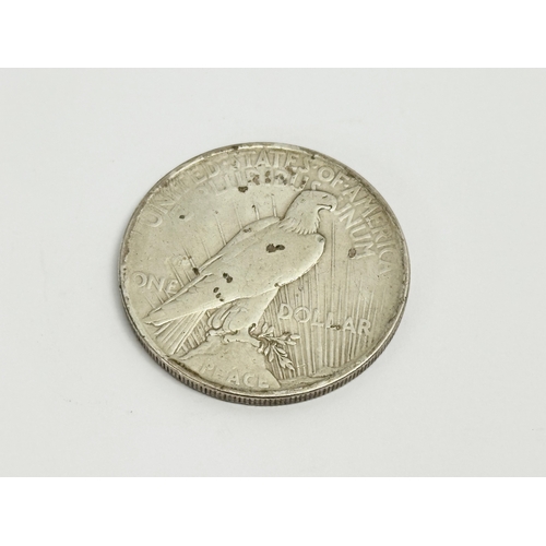 450 - A US silver dollar. 1928.