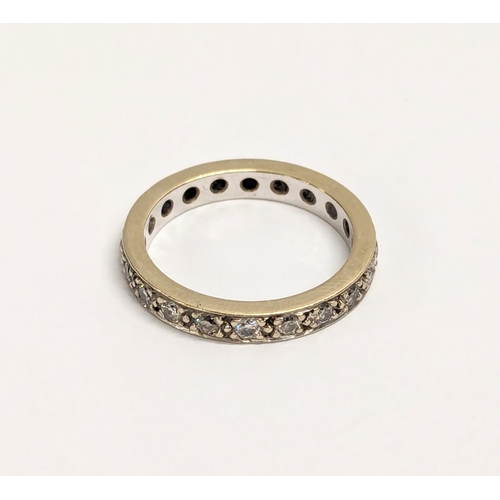 453 - A 18ct white gold and diamond full hoop eternity ring. 1ct of diamonds. UK size N.