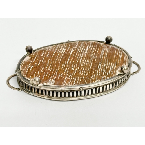 455 - A silver mounted miniature tray. 10x6cm