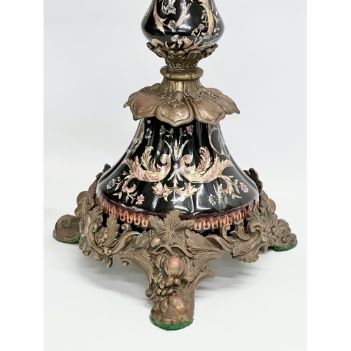 312 - A large ornate brass and enamelled porcelain candelabra. 34x34x61cm