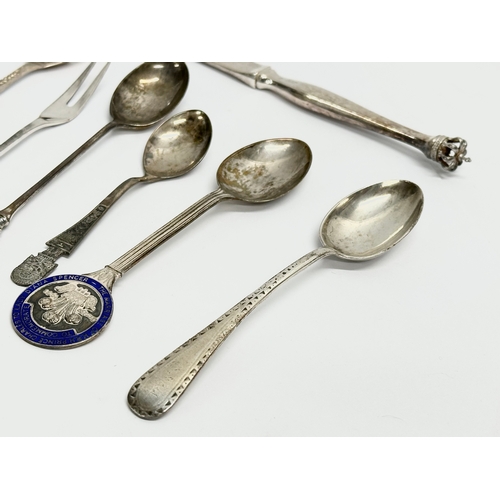 463 - A collection of silver spoons and knife. Sterling Denmark crowned butter knife and pickle fork etc. ... 