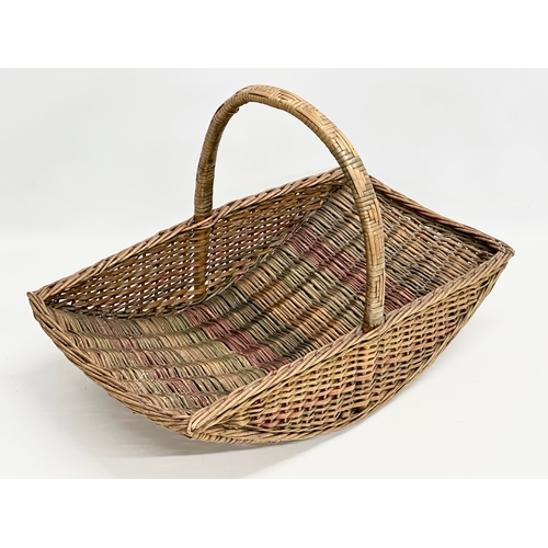 313 - A 1930’s wicker garden basket. 53x29x33cm