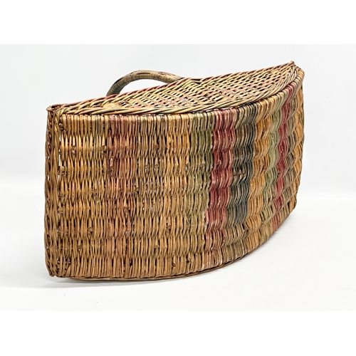 313 - A 1930’s wicker garden basket. 53x29x33cm