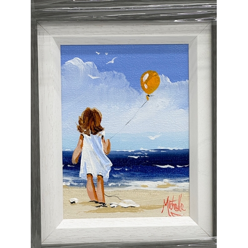 291 - An oil painting on board by Michelle Carlin. Balloon on the Beach. 13x17cm. Frame 33x37.5cm