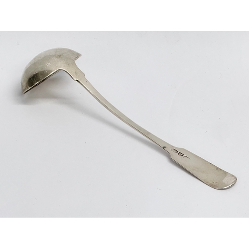 471 - A small silver ladle. 32.35 grams. 17cm