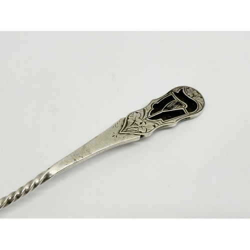 473 - An early 20th century Joseph Cook & Son silver spoon with Irish Harp and clover decoration. Birmingh... 