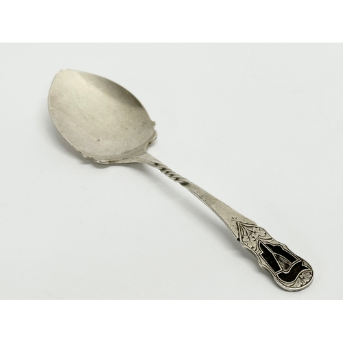 473 - An early 20th century Joseph Cook & Son silver spoon with Irish Harp and clover decoration. Birmingh... 