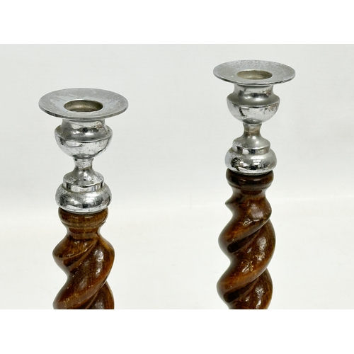 340 - A pair of vintage Barley Twist candlesticks. 22cm