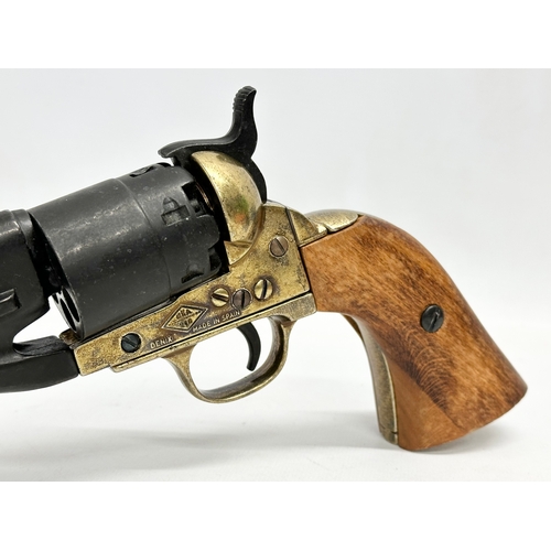 566 - A good quality replica pistol by Denix. Spain. 35cm