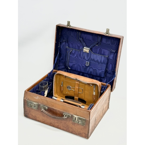 321 - A good quality Victorian leather vanity case. 43x38x19.5cm