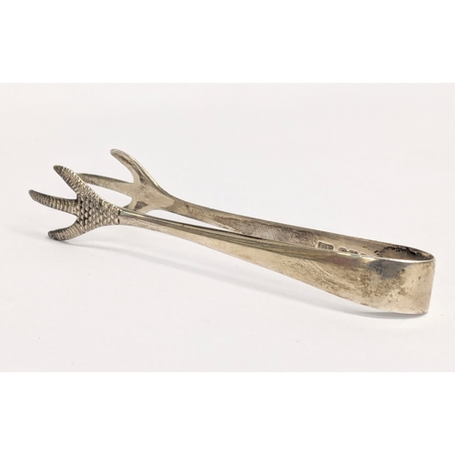 500 - An early 20th century Edward Viner silver sugar tongs, Sheffield, 1935. 8.94g