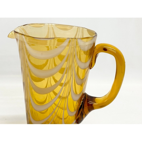 132 - A vintage Amber Glass pitcher jug with Milk Glass drapes. Circa 1930-1950. 19x12x19cm