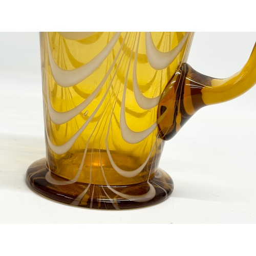 132 - A vintage Amber Glass pitcher jug with Milk Glass drapes. Circa 1930-1950. 19x12x19cm