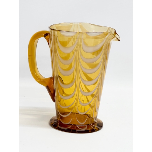 132 - A vintage Amber Glass pitcher jug with Milk Glass drapes. Circa 1930-1950. 19x12x19cm