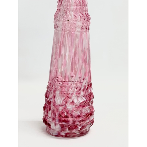 134 - A mid 19th century French Clichy Apper pink and milk glass bottle. Circa 1850. 28.5cm