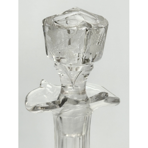 135 - A good quality early 20th century etched glass decanter with stopper. Decorated with leaves andgrape... 